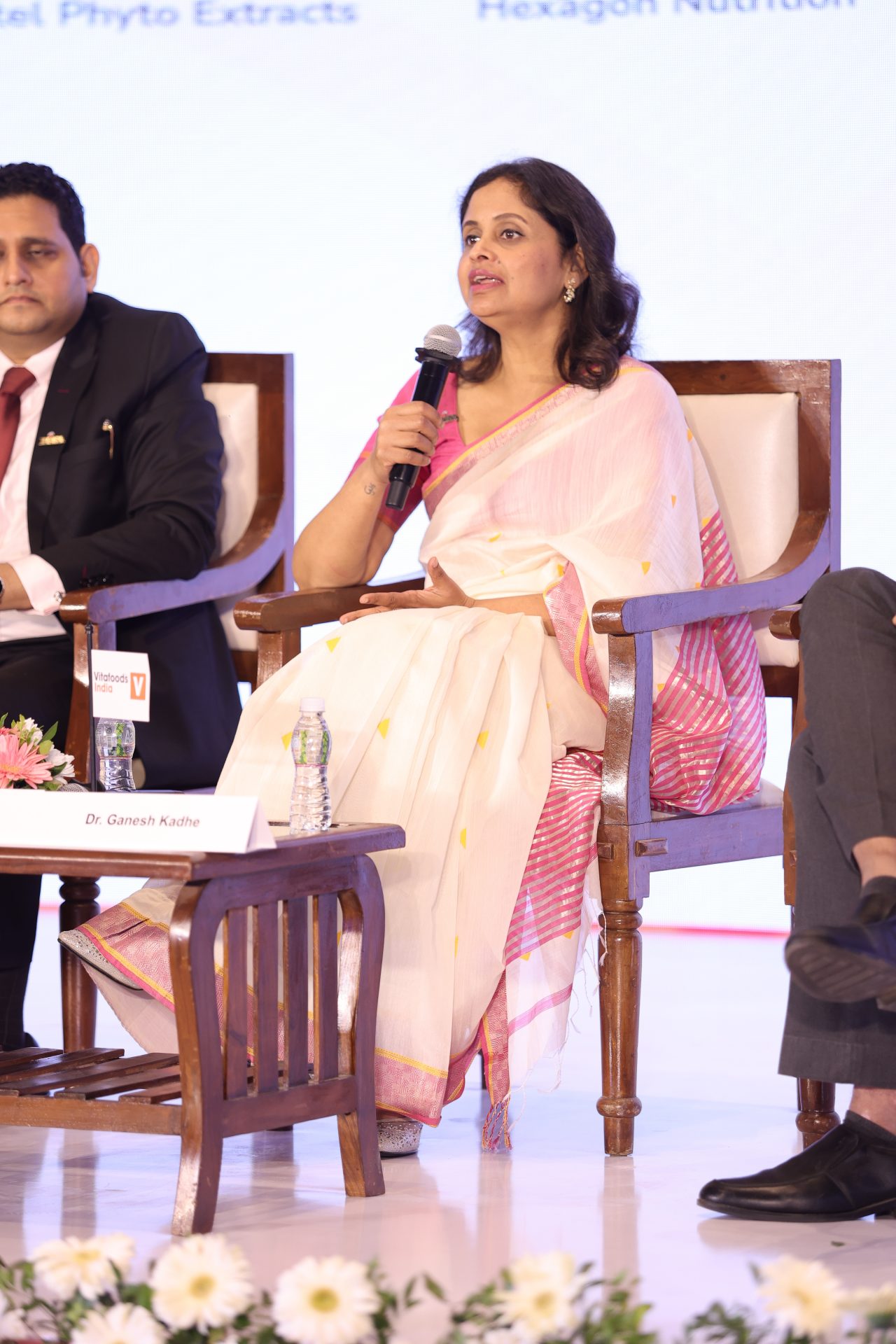 Woman giving speech at conference
